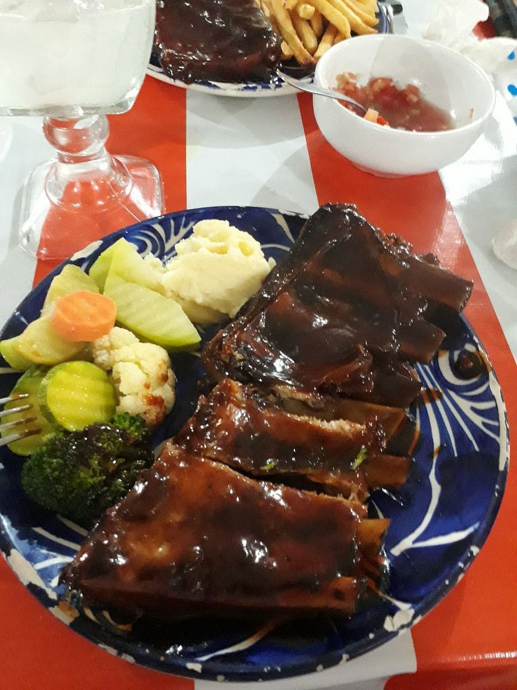 Juicy grilled cuts of meat and seafood